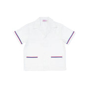 Mens white cabana shirt with red and blue trim around the arm holes and pockets